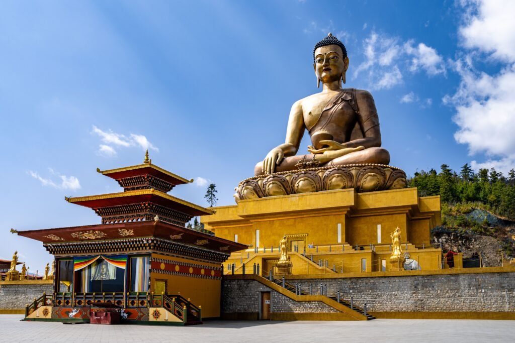 majestic buddha dordenma statue against the background of a blue sky. bhutan